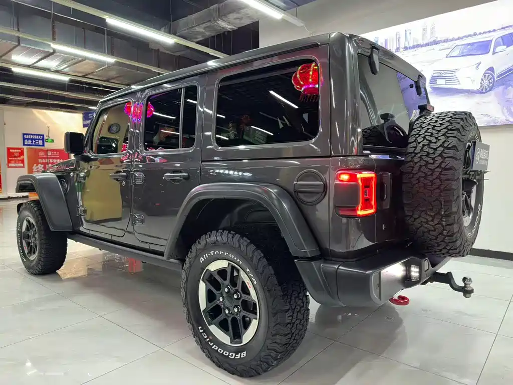 Jeep Jeep Wrangler 2019 2.0T Rubicon 4-Door Version国VI  Wait, I need to correct this. The "国VI" refers to China's emission standard (National VI), which isn't typically part of the international model name. The internationally accepted name would be:  Jeep Wrangler 2019 2.0T Rubicon 4-Door 2019 - thumbnail 4