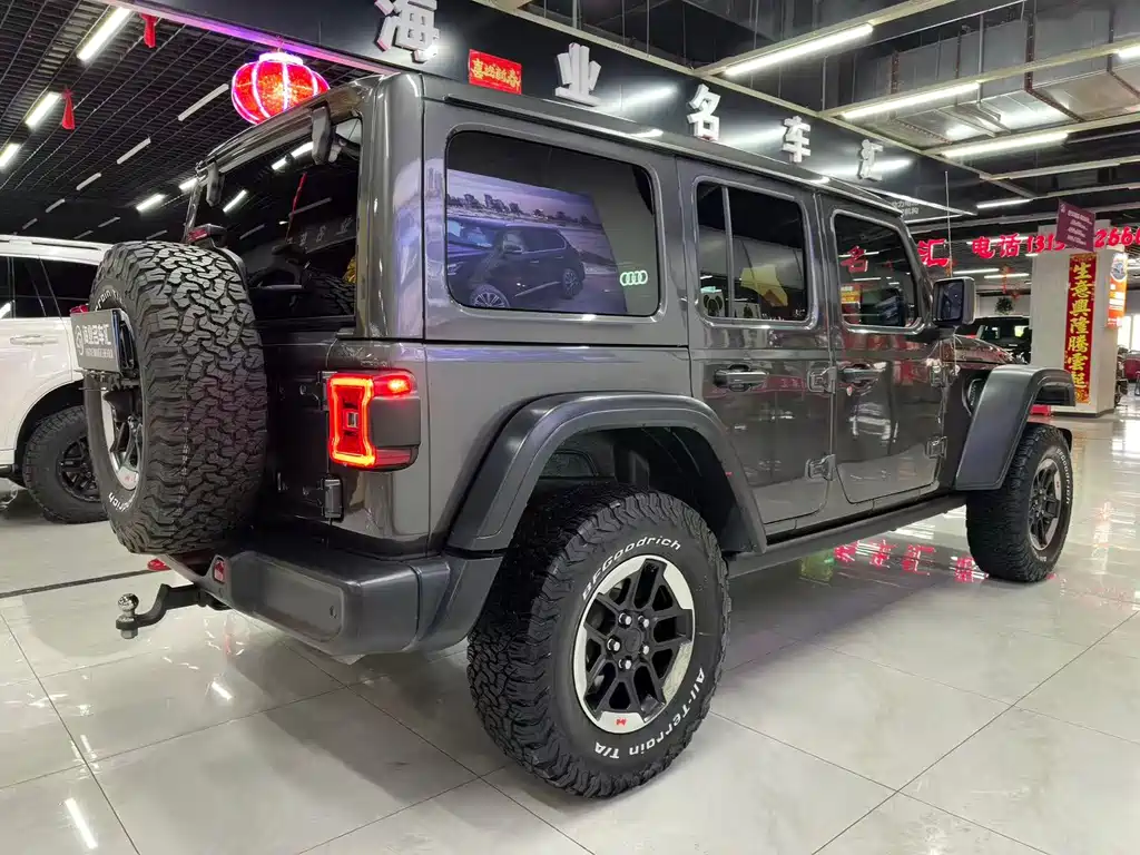 Jeep Jeep Wrangler 2019 2.0T Rubicon 4-Door Version国VI  Wait, I need to correct this. The "国VI" refers to China's emission standard (National VI), which isn't typically part of the international model name. The internationally accepted name would be:  Jeep Wrangler 2019 2.0T Rubicon 4-Door 2019 - thumbnail 6