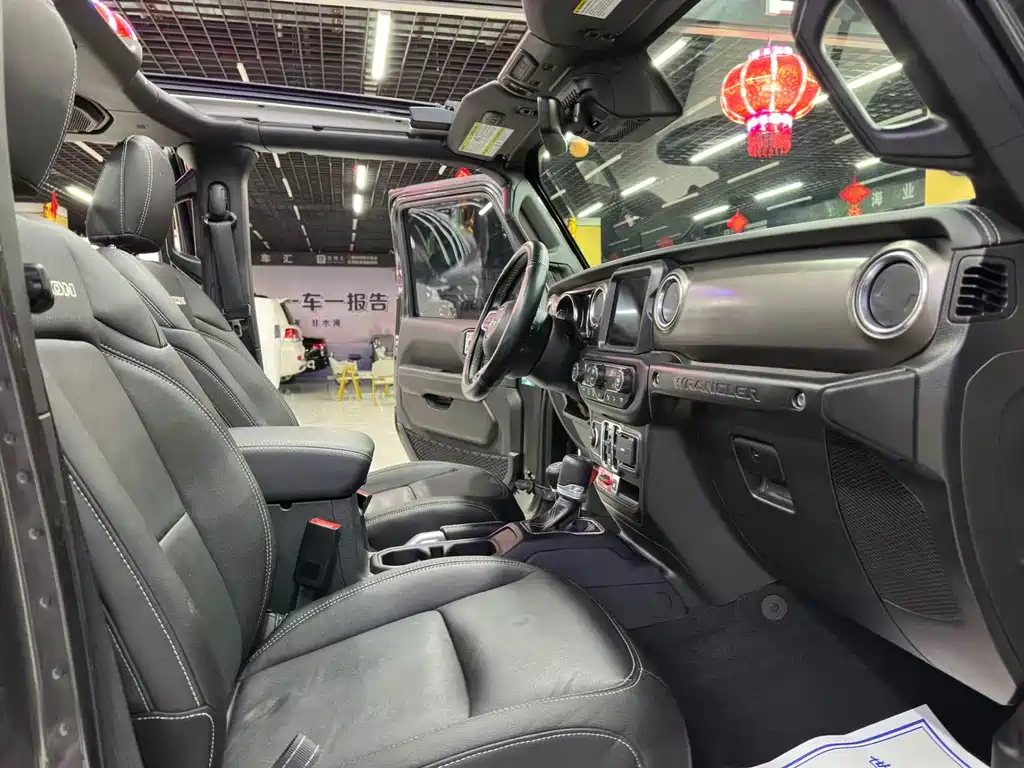 Jeep Jeep Wrangler 2019 2.0T Rubicon 4-Door Version国VI  Wait, I need to correct this. The "国VI" refers to China's emission standard (National VI), which isn't typically part of the international model name. The internationally accepted name would be:  Jeep Wrangler 2019 2.0T Rubicon 4-Door 2019 - thumbnail 27