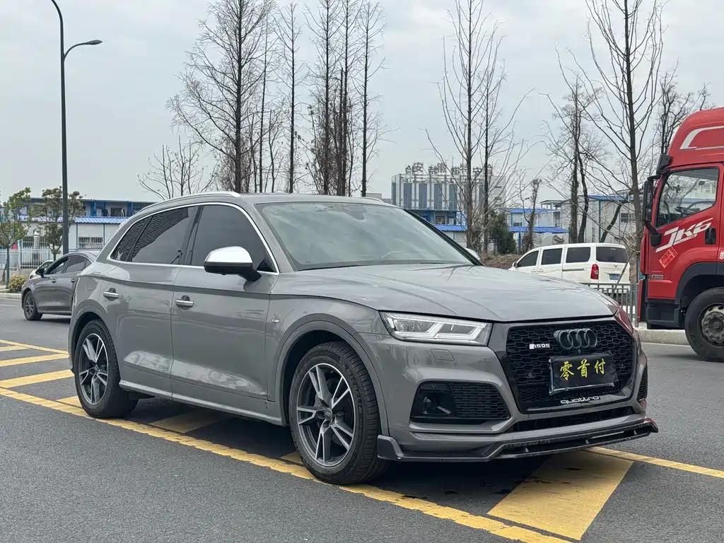 Audi Audi Q5L 2018 45 TFSI Premium Fashion Model国VI  Wait, let me correct that - the "国VI" is referring to China's emission standard (China VI), which isn't typically part of the international model name. The internationally accepted translation would be:  Audi Q5L 2018 45 TFSI Premium Fashion Model 2019 - thumbnail 3