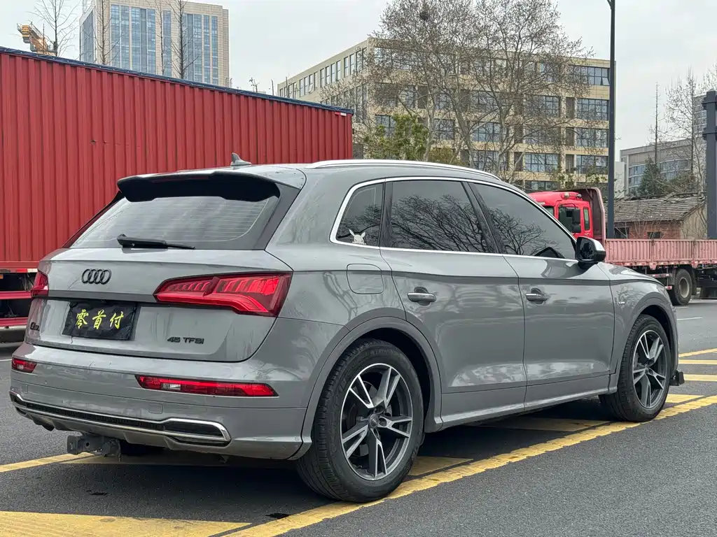 Audi Audi Q5L 2018 45 TFSI Premium Fashion Model国VI  Wait, let me correct that - the "国VI" is referring to China's emission standard (China VI), which isn't typically part of the international model name. The internationally accepted translation would be:  Audi Q5L 2018 45 TFSI Premium Fashion Model 2019 - thumbnail 9